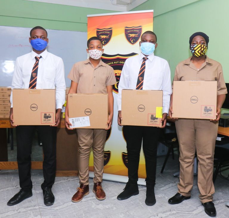 Cornwall College students pose with the donated labtops. 